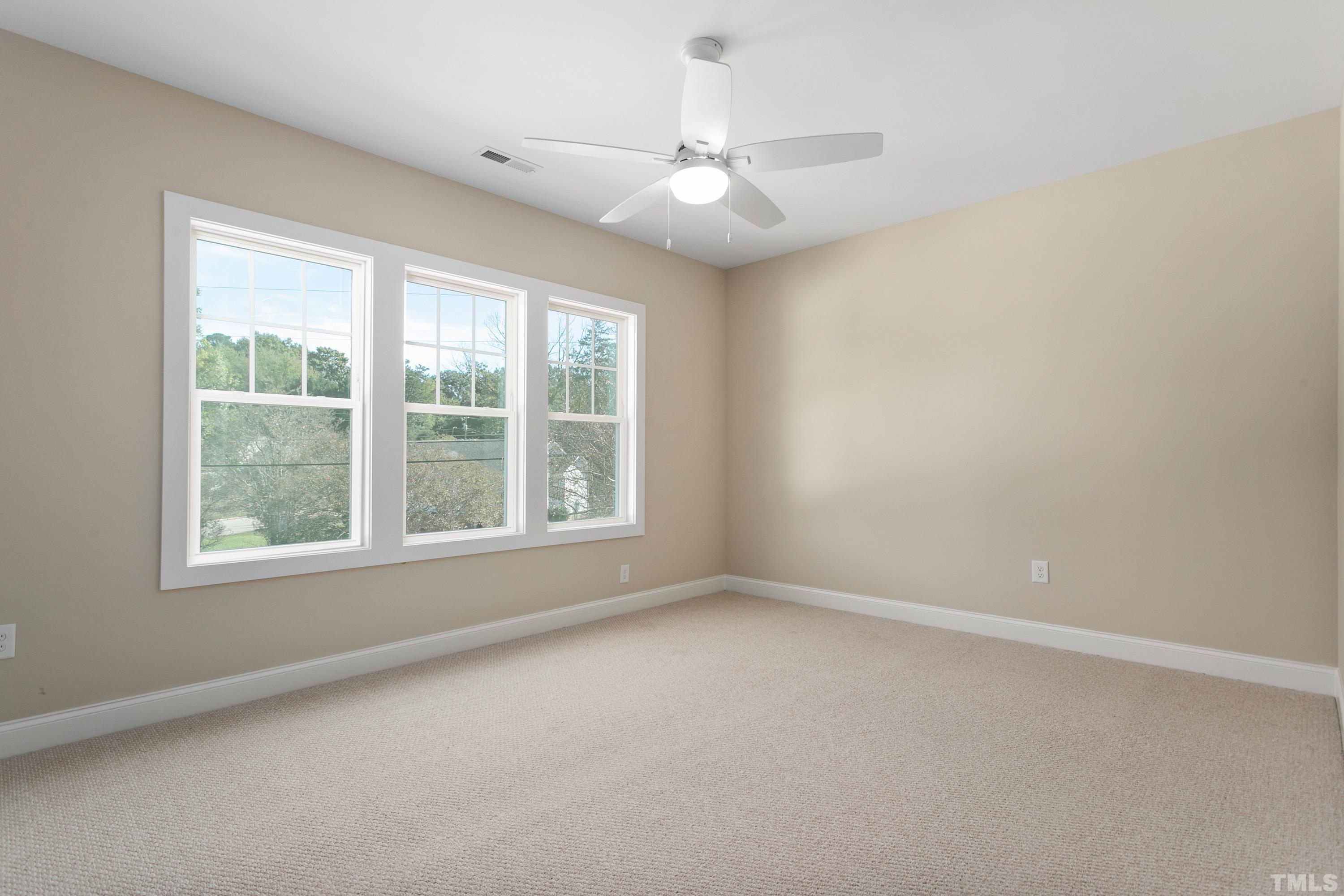 202 Myers Avenue Raleigh, NC 27604 - Photo 19 of 26 an empty room with a window