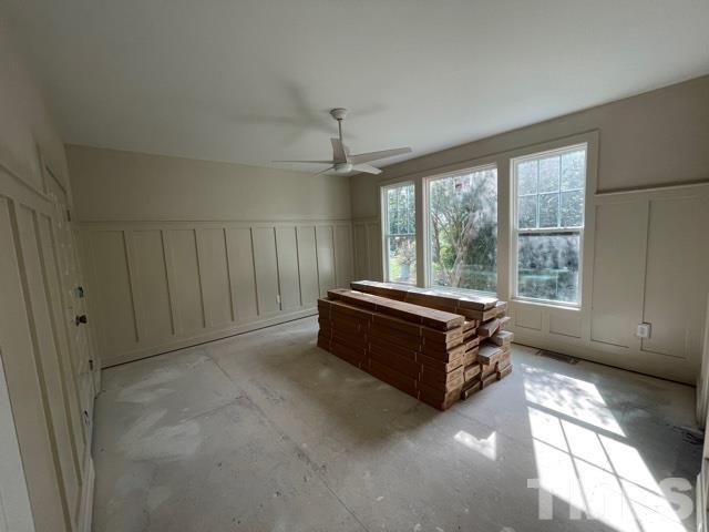 202 Myers Avenue Raleigh, NC 27604 - Photo 4 of 26 a room with a large window and couch