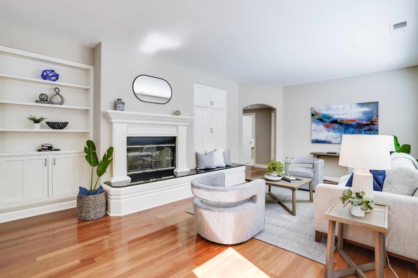 5929 Lantana Way San Ramon, CA 94582 - Photo 18 of 61 a living room with furniture a fireplace and a potted plant
