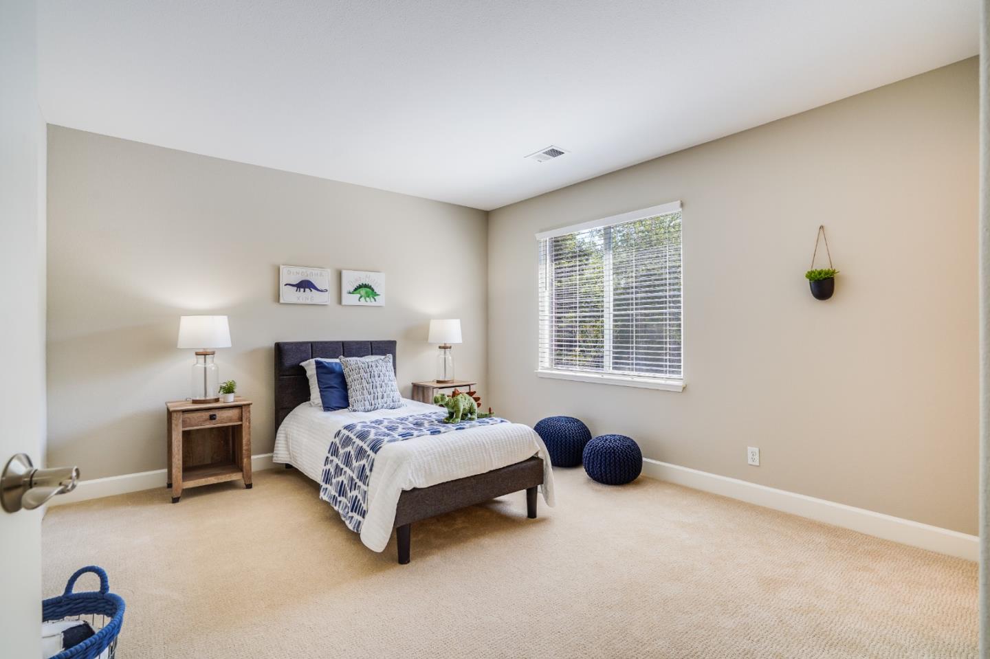 5929 Lantana Way San Ramon, CA 94582 - Photo 35 of 61 a bedroom with a bed and a table