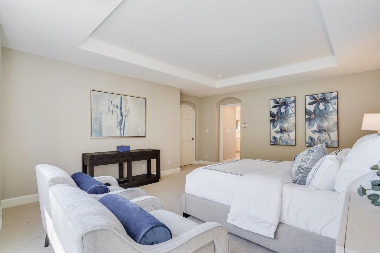 5929 Lantana Way San Ramon, CA 94582 - Photo 46 of 61 a bedroom with a bed and a painting on the wall