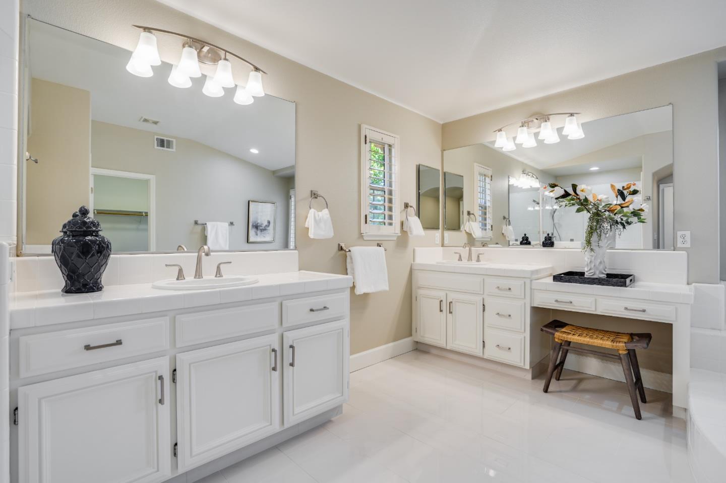 5929 Lantana Way San Ramon, CA 94582 - Photo 49 of 61 a spacious en suite bathroom with double sink a mirror and a shower