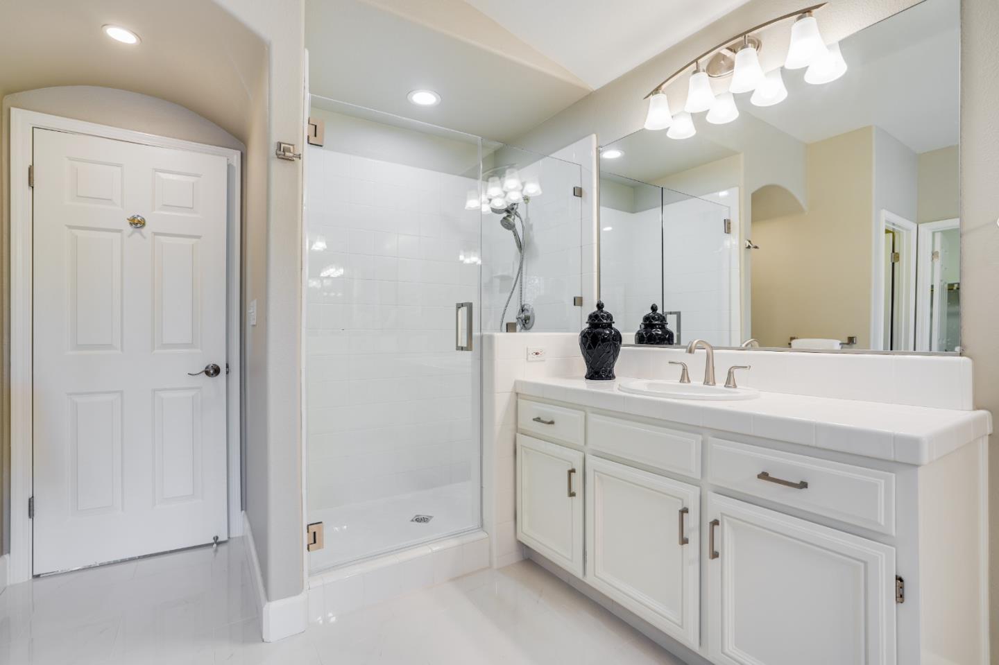 5929 Lantana Way San Ramon, CA 94582 - Photo 51 of 61 a bathroom with a double vanity sink mirror and shower
