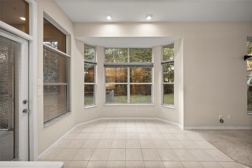 20698 Southwest 93rd Lane Road Dunnellon, FL 34431 - Photo 14 of 34 a view of an empty room with a window