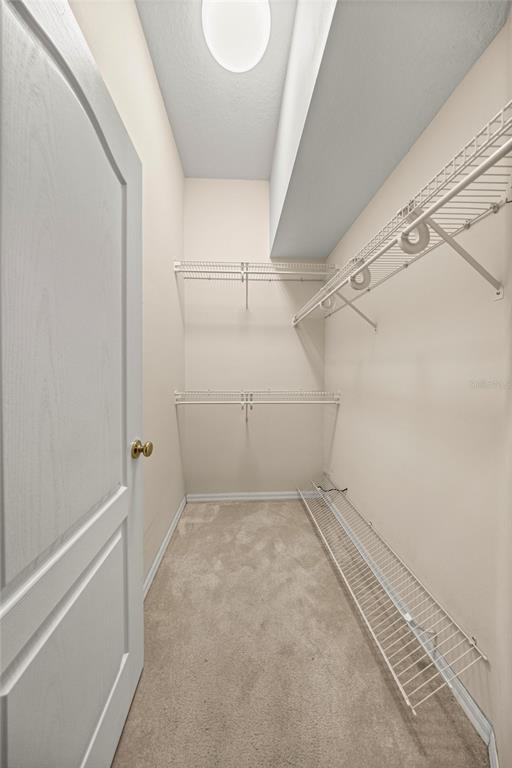 20698 Southwest 93rd Lane Road Dunnellon, FL 34431 - Photo 26 of 34 a view of a room with racks on the wall