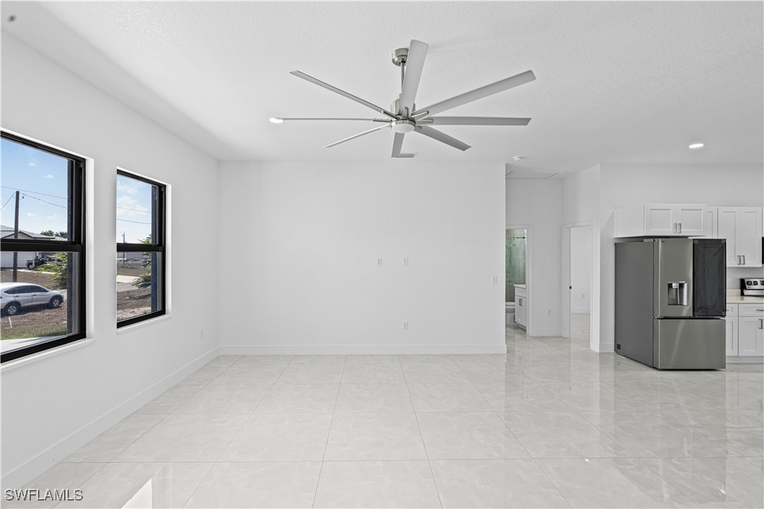 7029 Hero Court LaBelle, FL 33935 - Photo 14 of 36 an empty room with closet and windows