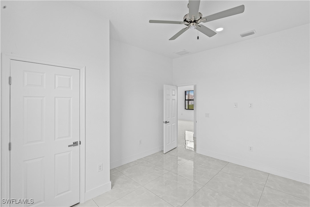 7029 Hero Court LaBelle, FL 33935 - Photo 23 of 36 wooden floor in an empty room