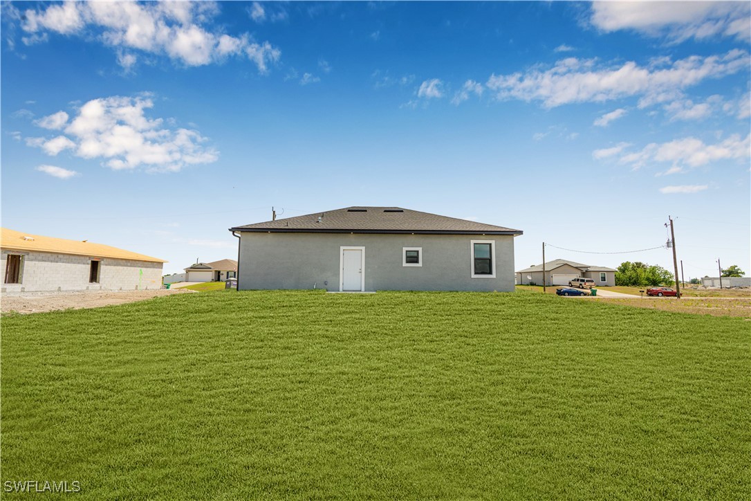 7029 Hero Court LaBelle, FL 33935 - Photo 30 of 36 a house view with a garden space