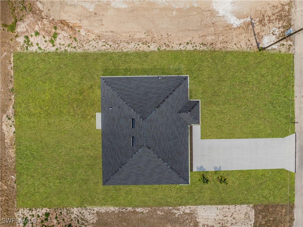 7029 Hero Court LaBelle, FL 33935 - Photo 35 of 36 a view of a terrace with a yard