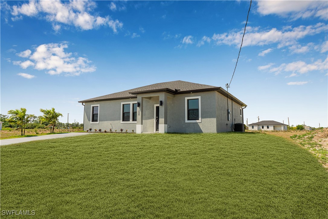 7029 Hero Court LaBelle, FL 33935 - Photo 10 of 36 a house view with a garden space