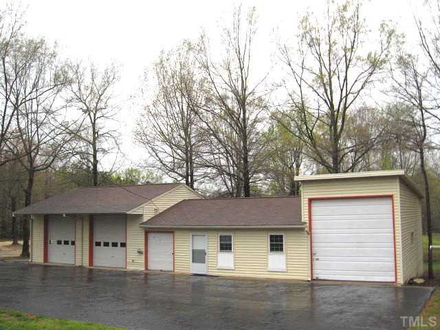 3817 Cheek Road Durham, NC 27704 - Photo 16 of 18 Double garage, single oversized garage, & apartment suite Parking Lot/Garage