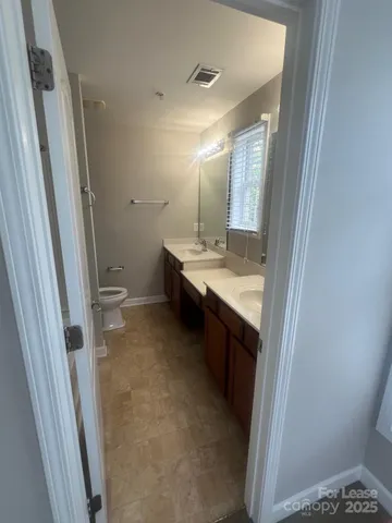 a city view from a balcony