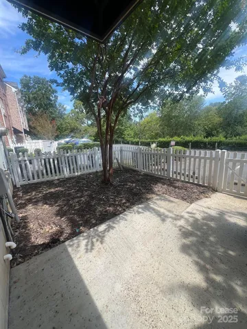a view of a deck with a fence