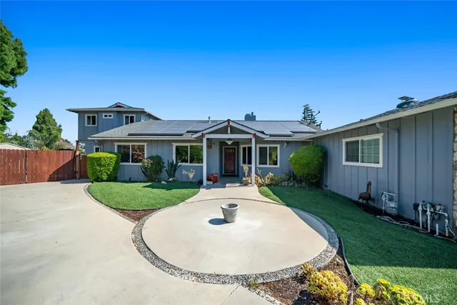a view of a house with a sink and a garden