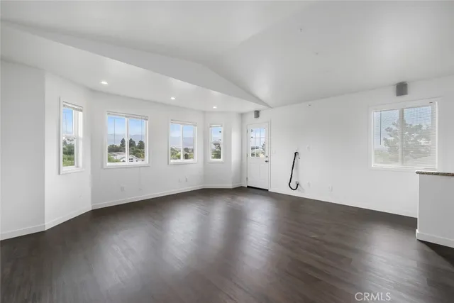 a spacious bathroom with a granite countertop sink mirror and double