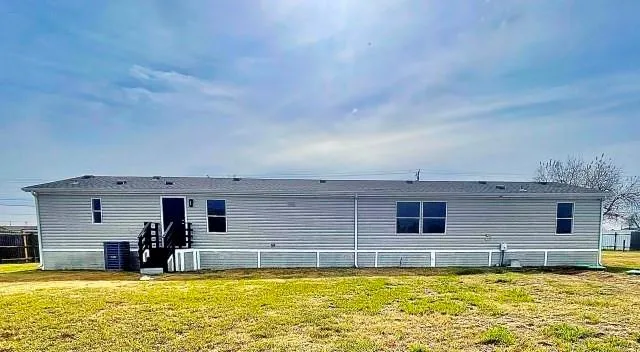 a view of a swimming pool with an outdoor seating
