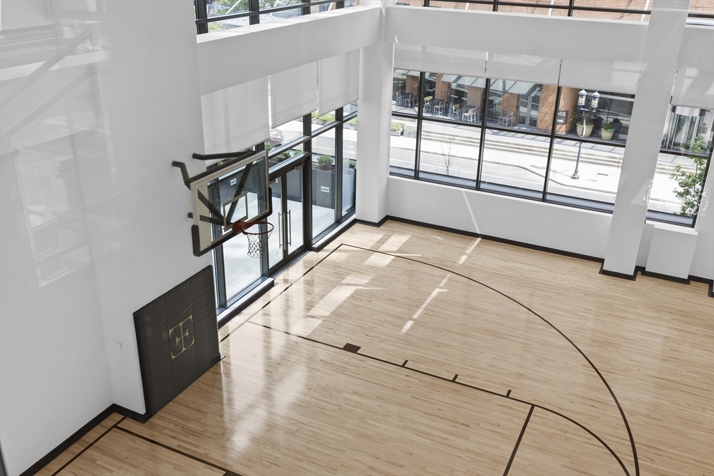 135 Seaport Boulevard, Unit 905 Boston, MA 02210 - Photo 19 of 21 a view of entryway and hall with wooden floor