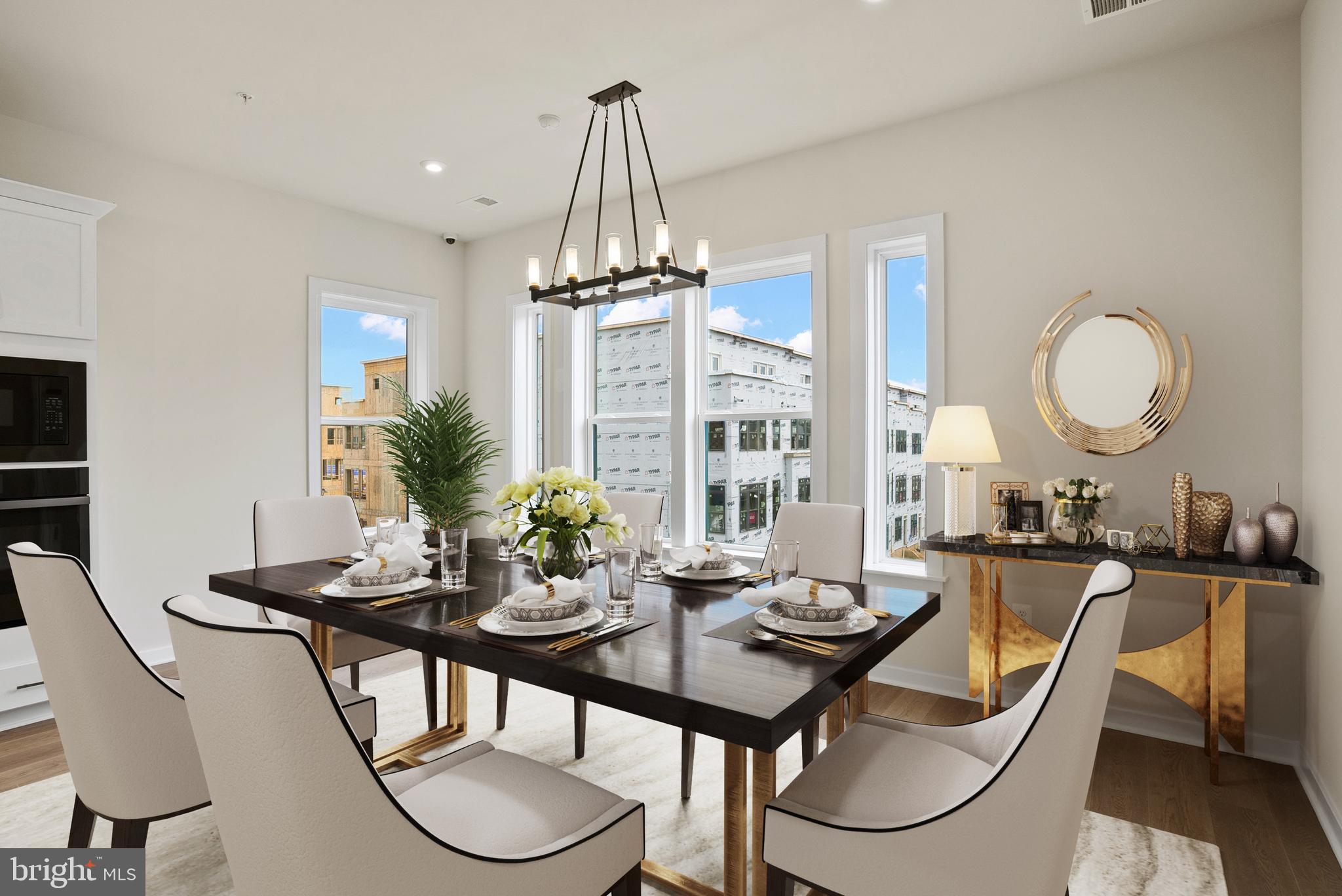 6717 Belcrest Road Hyattsville, MD 20782 - Photo 4 of 29 a view of a dining room with furniture window and wooden floor