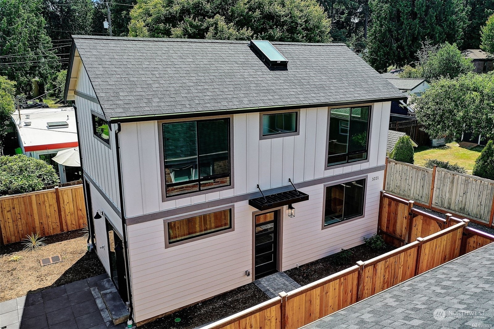3221 Northeast 86th Street Seattle, WA 98115 - Photo 2 of 22 a view of a house with roof deck