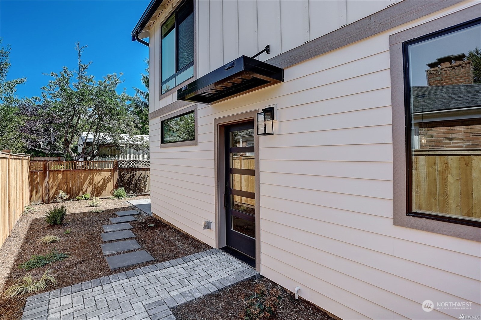 3221 Northeast 86th Street Seattle, WA 98115 - Photo 5 of 22 a view of a house with a door