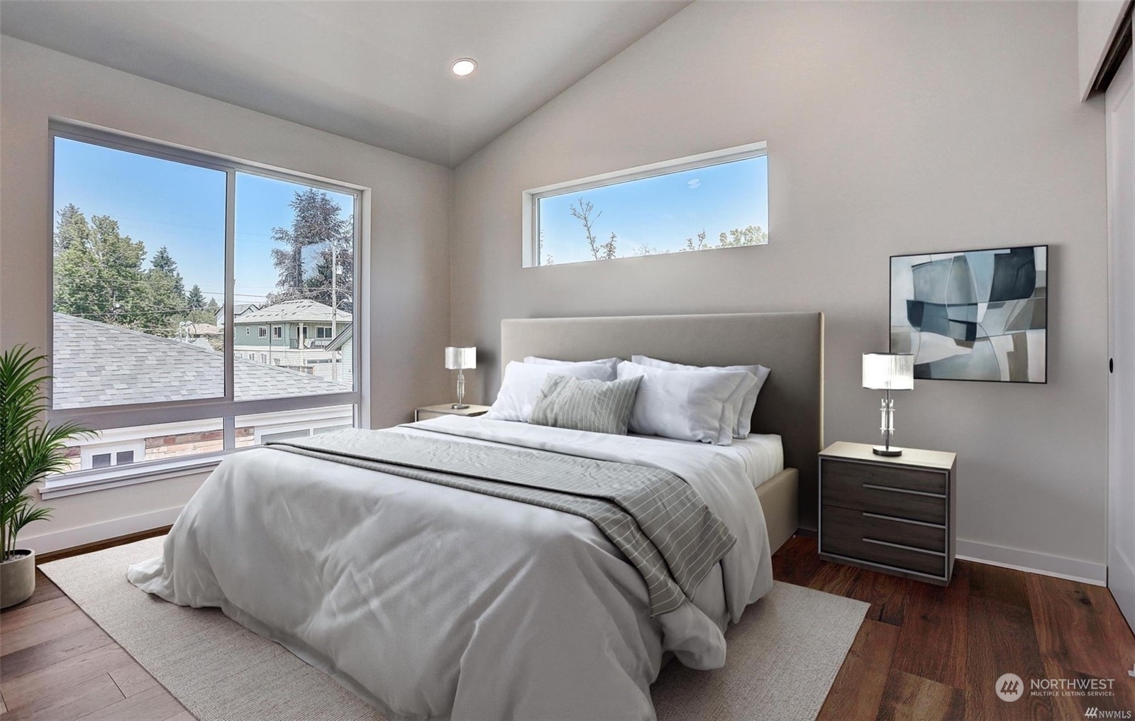3221 Northeast 86th Street Seattle, WA 98115 - Photo 10 of 22 a bedroom with a bed and a large window