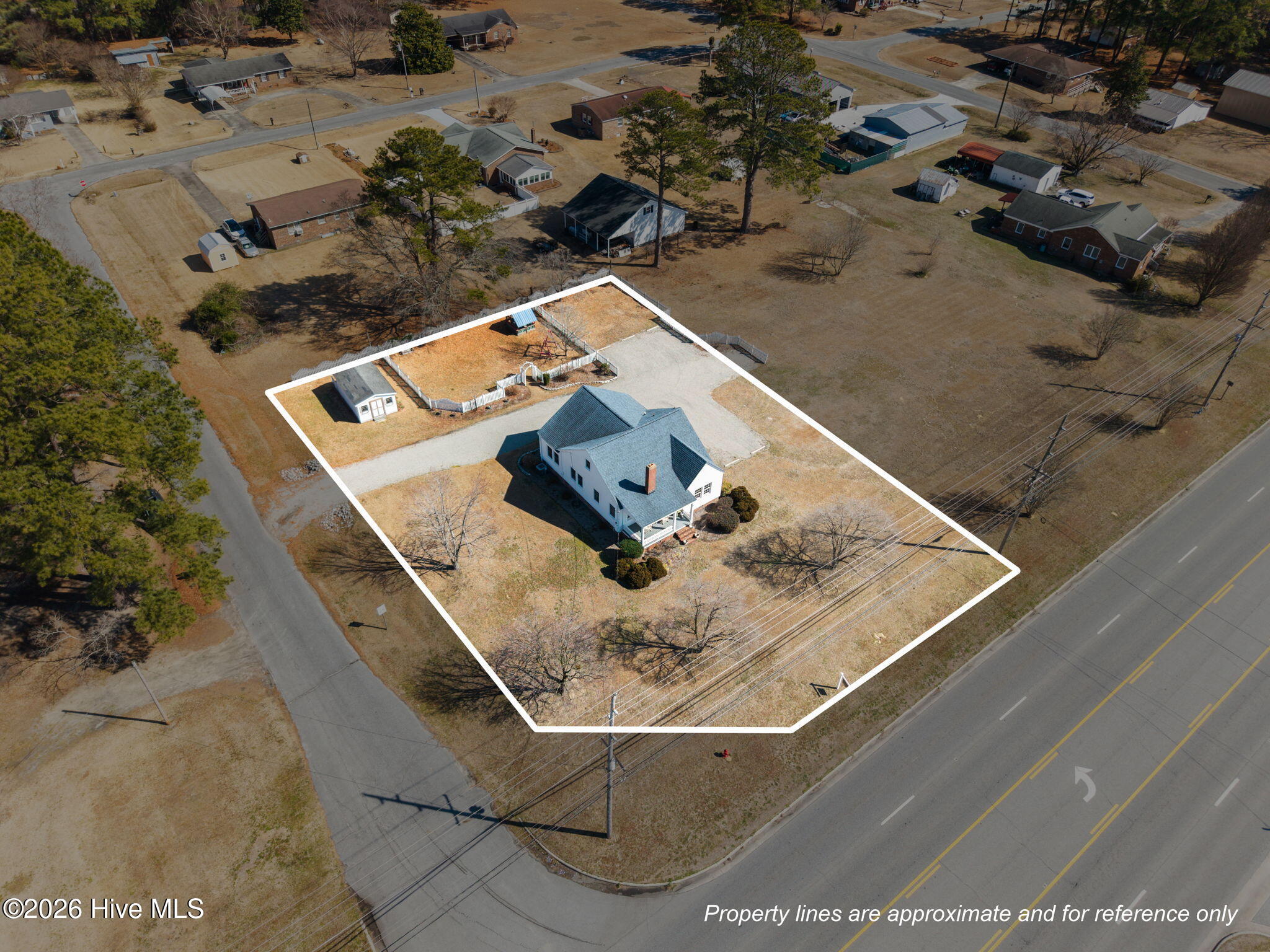 2280 West 5th Street Washington, NC 27889 - Photo 47 of 51 Some fencing and the gravel parking are encroaching onto the neighboring lot. The neighboring lot is available for separate purchase