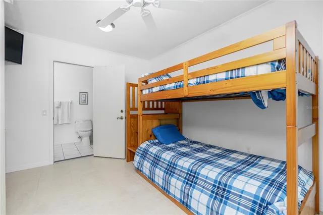 a bedroom with a bed and a walk in closet