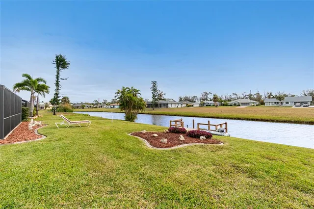 a view of a swimming pool with an ocean view