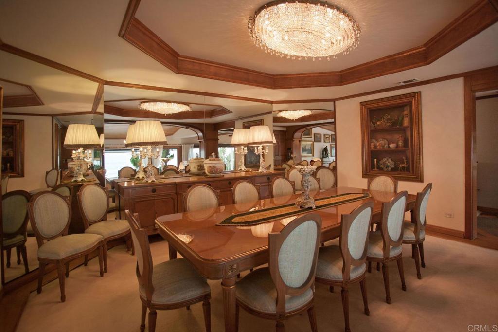 Tijuana-ensenada Transp Highway Sanger, CA 93657 - Photo 13 of 38 a view of a dining room with furniture and chandelier