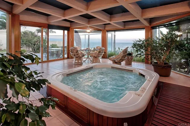 a view of a swimming pool with a sitting space