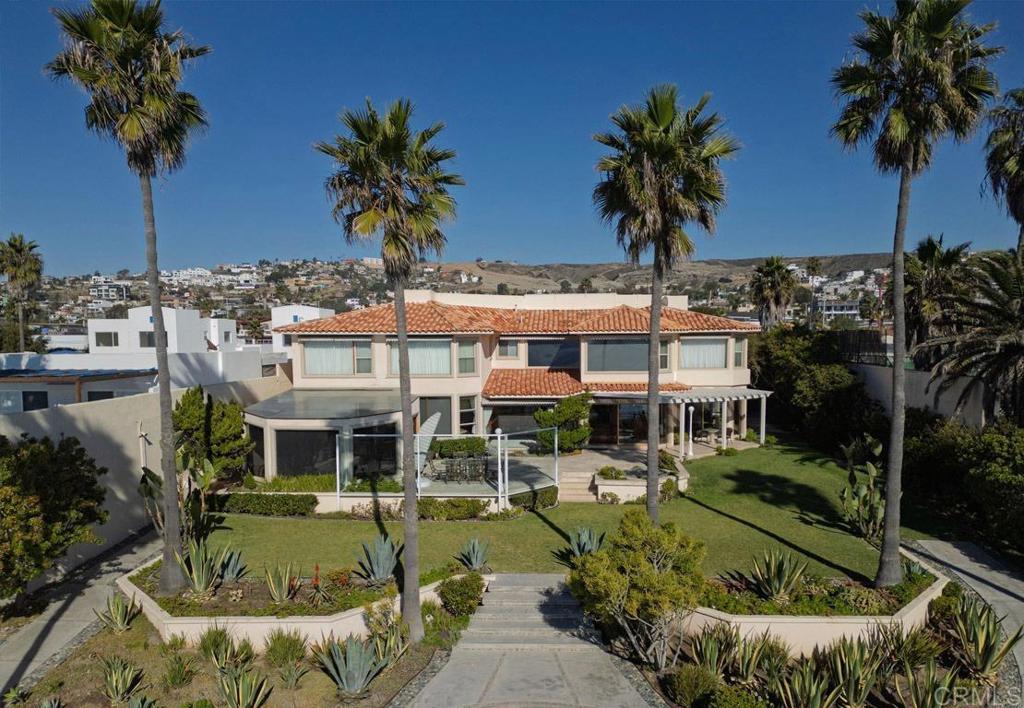 Tijuana-ensenada Transp Highway Sanger, CA 93657 - Photo 37 of 38 a front view of a house with garden and patio