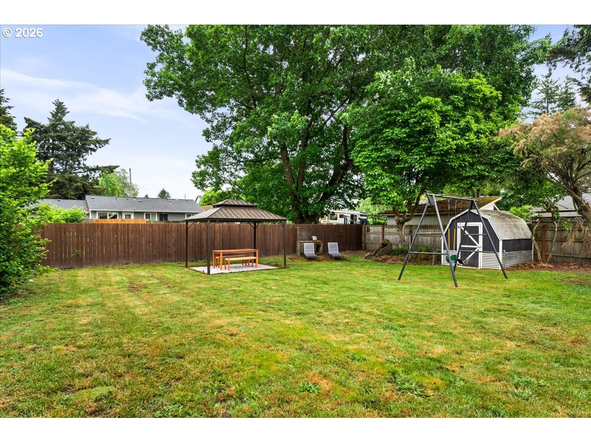 622 Southwest Utah Street Camas, WA 98607 - Photo 39 of 44 a backyard of a house with lots of green space