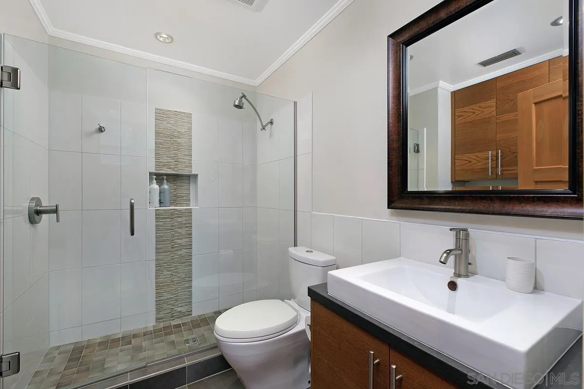 345 Neptune Avenue Encinitas, CA 92024 - Photo 21 of 29 a bathroom with a sink toilet and shower