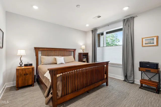 a bathroom with a granite countertop sink double and mirror