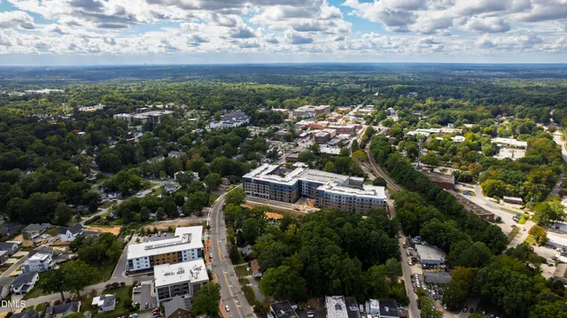 a view of a city with mountains in the background