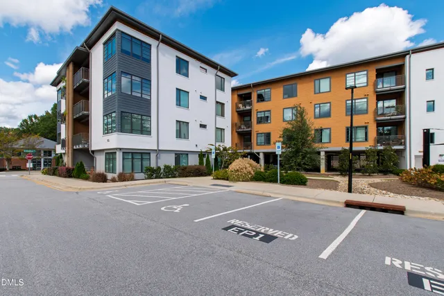 a view of a building with a street