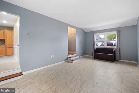 a view of a livingroom with furniture and window
