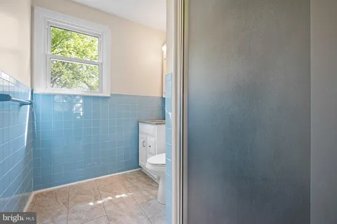 a bathroom with a toilet