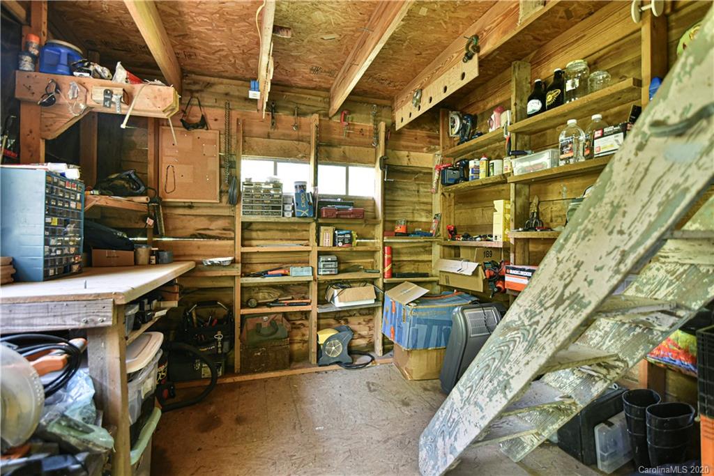 6295 Crabtree Road Clyde, NC 28721 - Photo 15 of 37 a view of storage and utility room