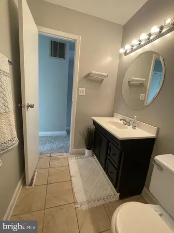 a view of entryway with stairs and wooden floor