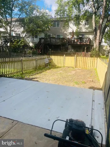 a view of balcony with furniture