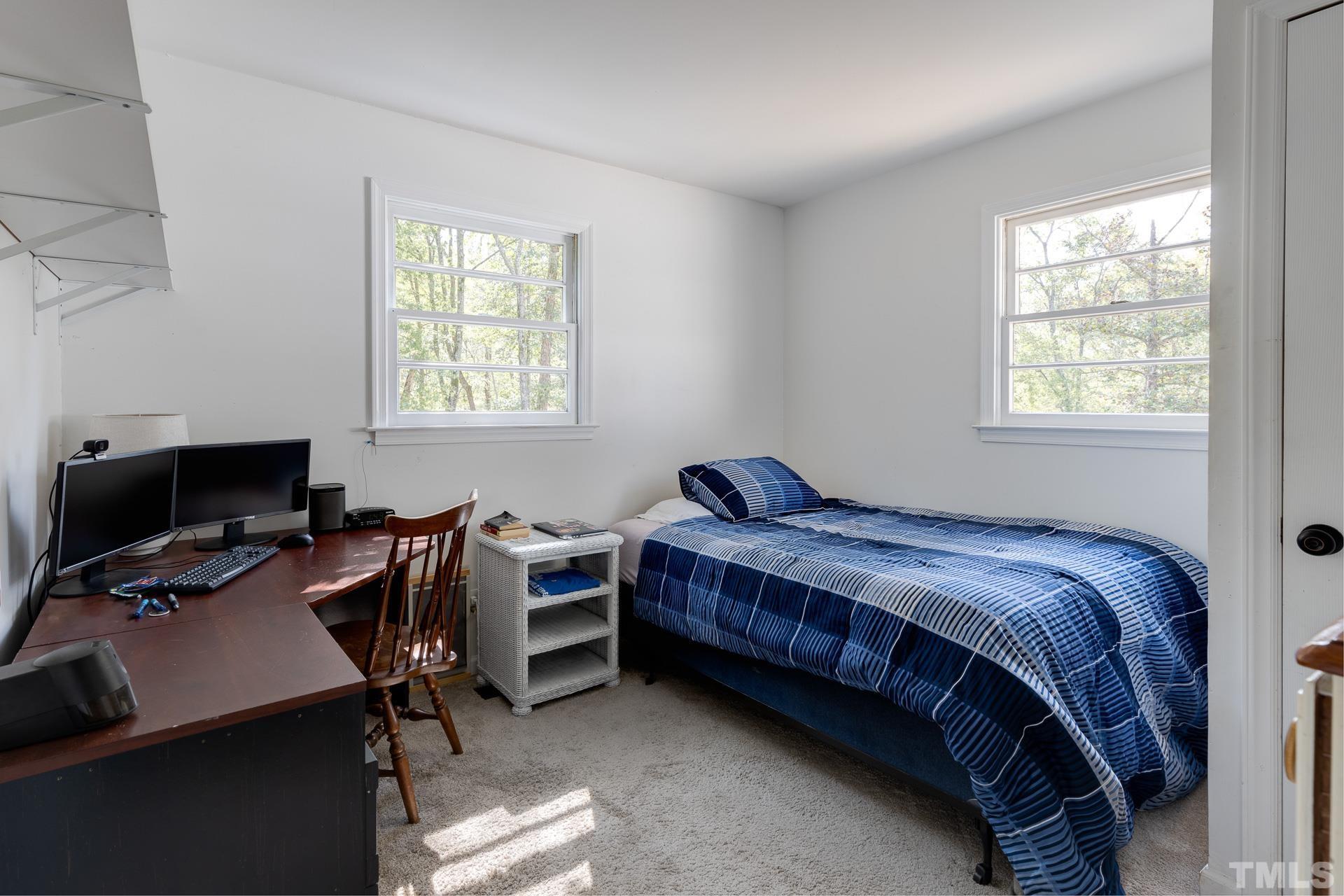 6518 New Sharon Church Road Rougemont, NC 27572 - Photo 20 of 29 a bedroom with a bed and a desk