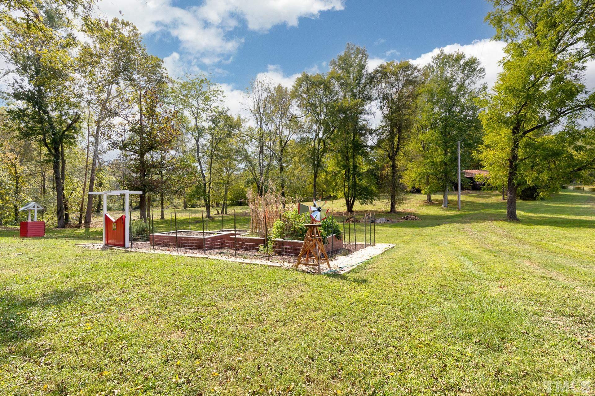 6518 New Sharon Church Road Rougemont, NC 27572 - Photo 28 of 29 a view of a park with swings and slides