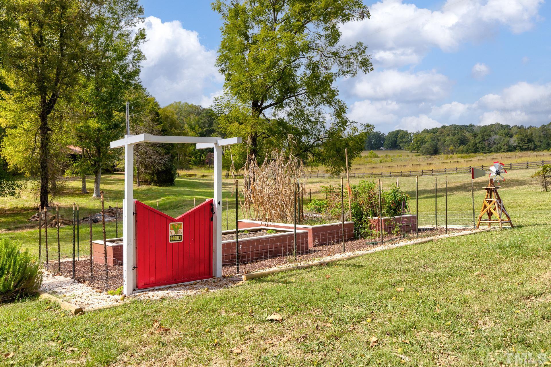 6518 New Sharon Church Road Rougemont, NC 27572 - Photo 5 of 29 an outdoor space with garden and trees