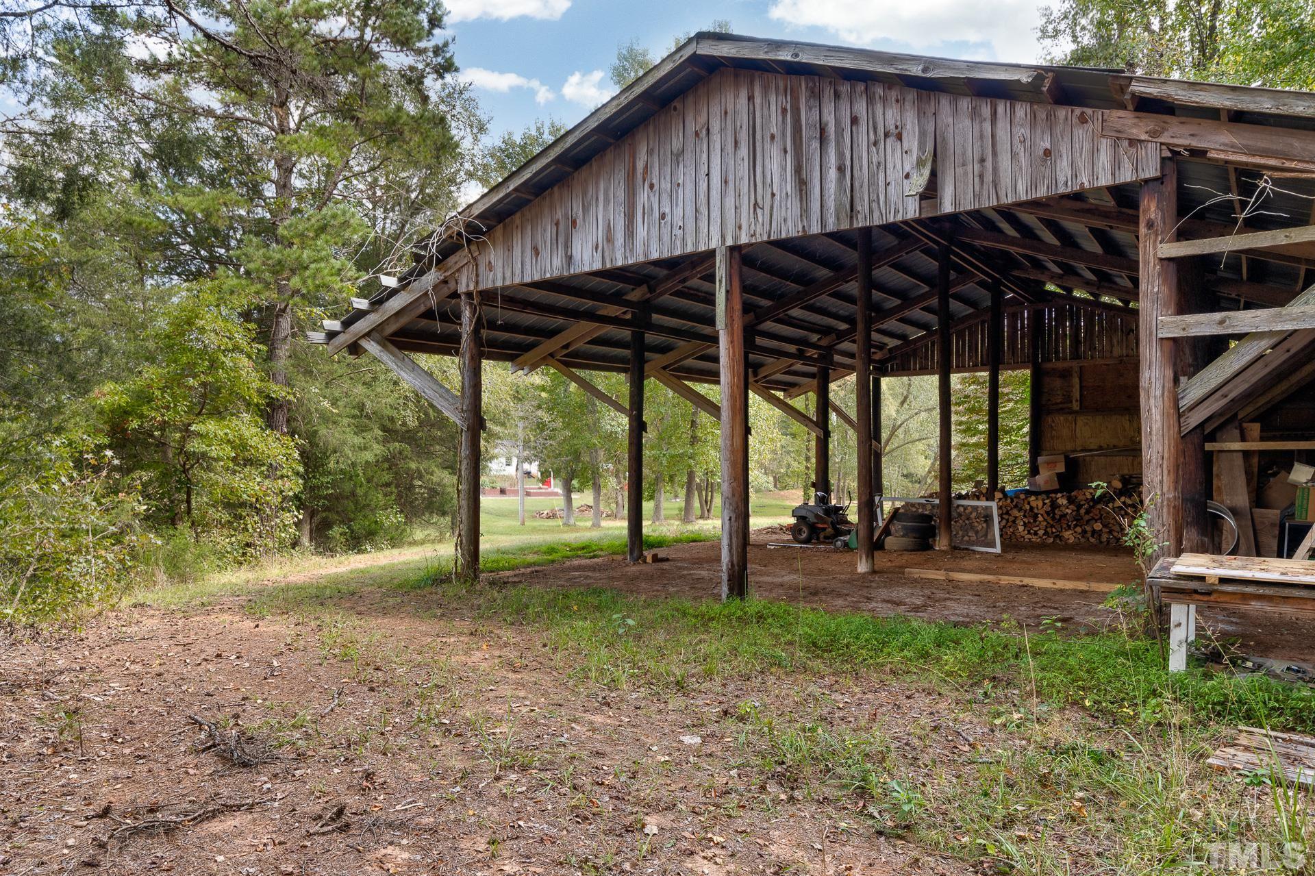 6518 New Sharon Church Road Rougemont, NC 27572 - Photo 6 of 29 a view of a house with backyard and sitting area