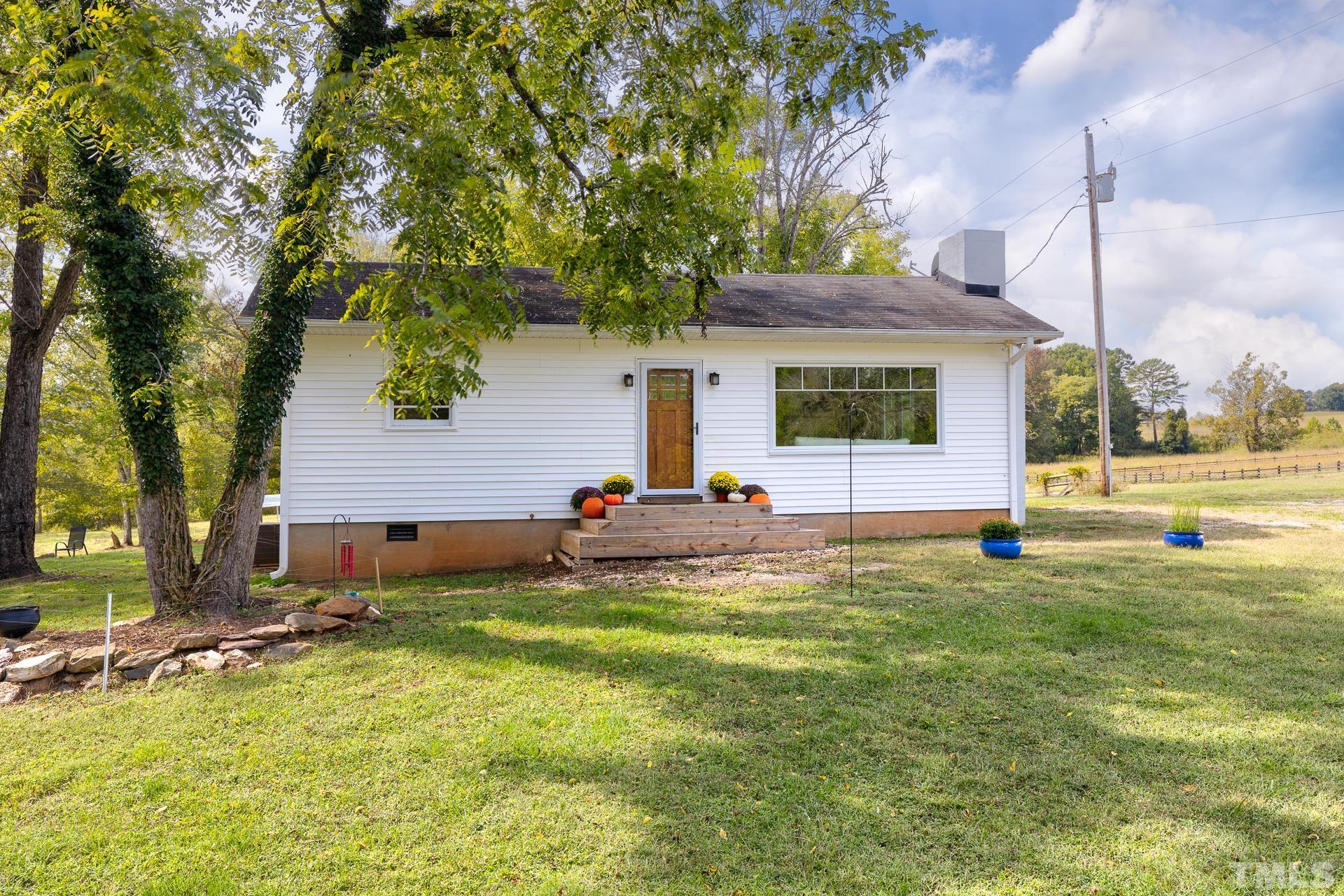 6518 New Sharon Church Road Rougemont, NC 27572 - Photo 7 of 29 a view of a backyard with a sitting area