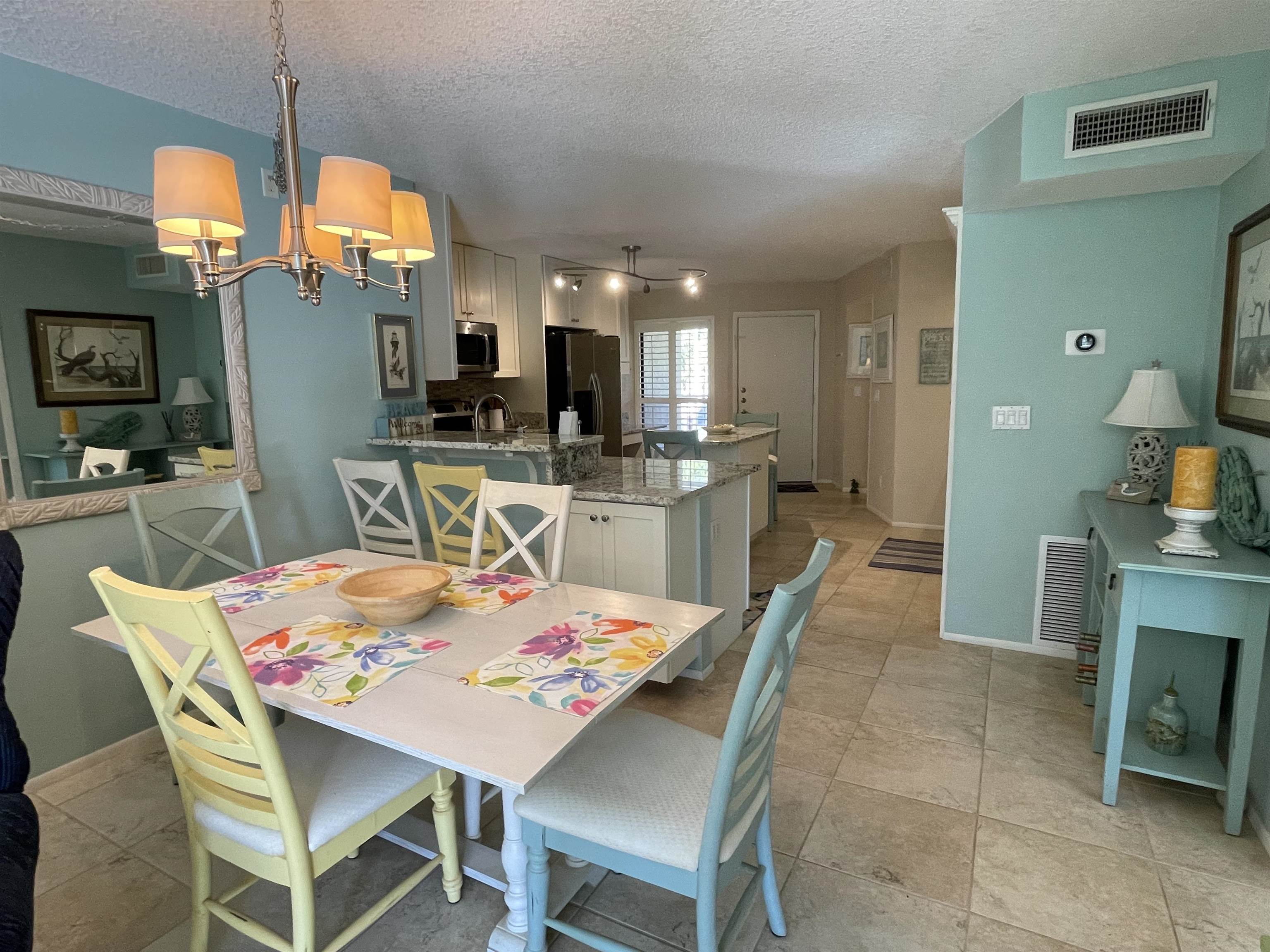 213 Pacifica Vista Way St. Augustine, FL 32080 - Photo 16 of 29 a view of a dining room with furniture