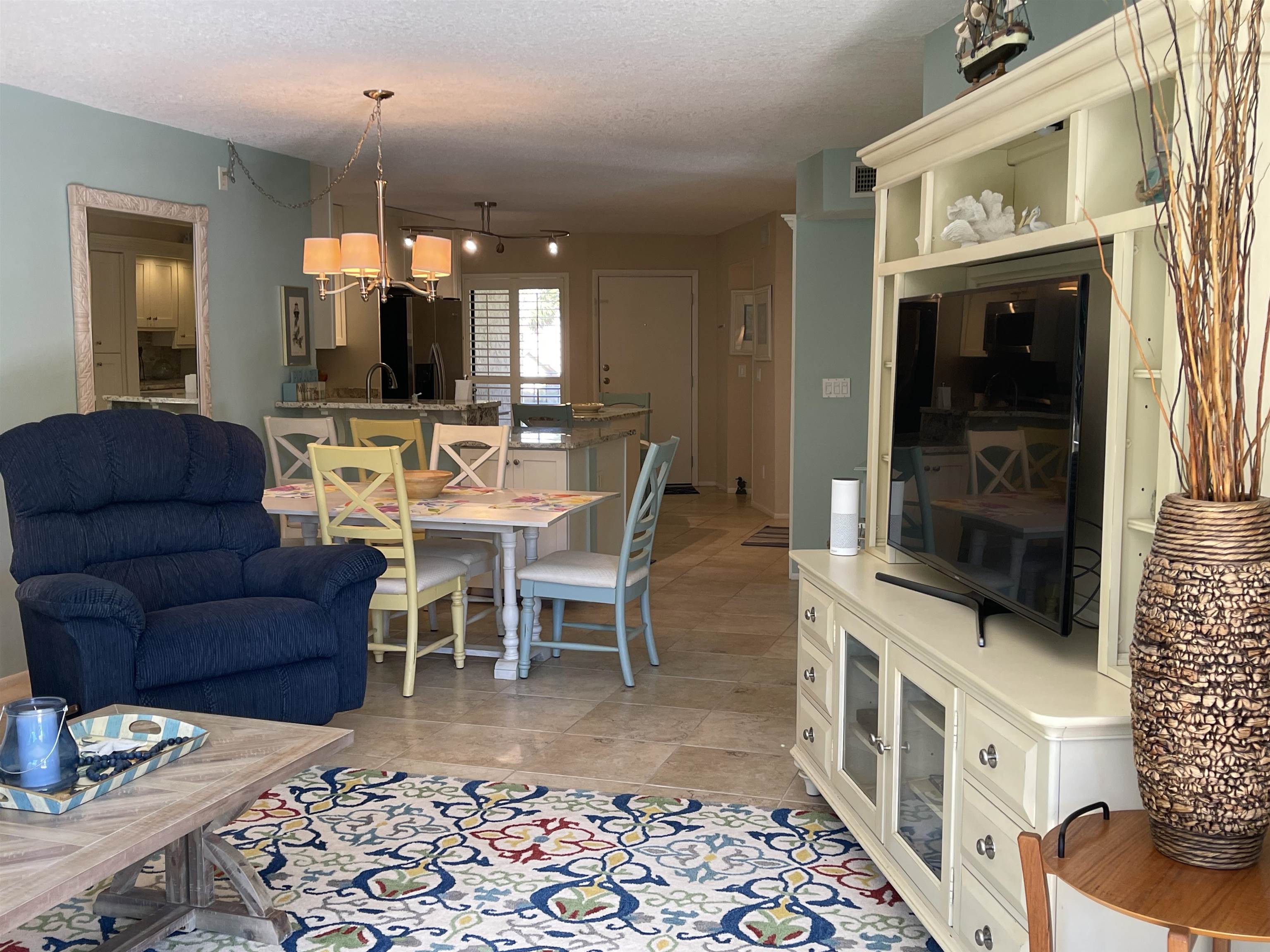 213 Pacifica Vista Way St. Augustine, FL 32080 - Photo 19 of 29 a view of a livingroom with furniture and window