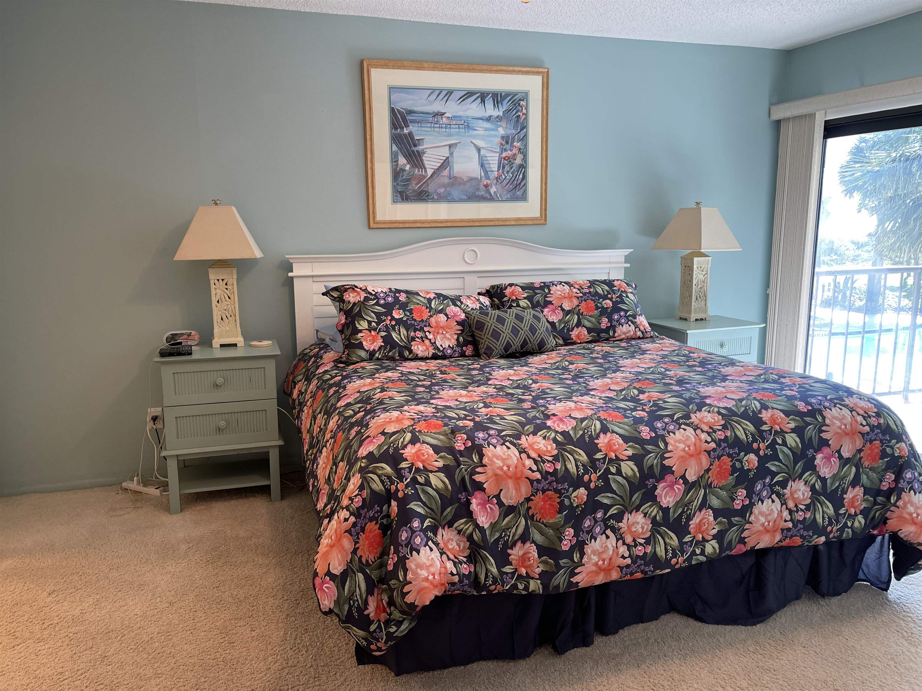 213 Pacifica Vista Way St. Augustine, FL 32080 - Photo 20 of 29 a bed sitting in a bedroom next to a window