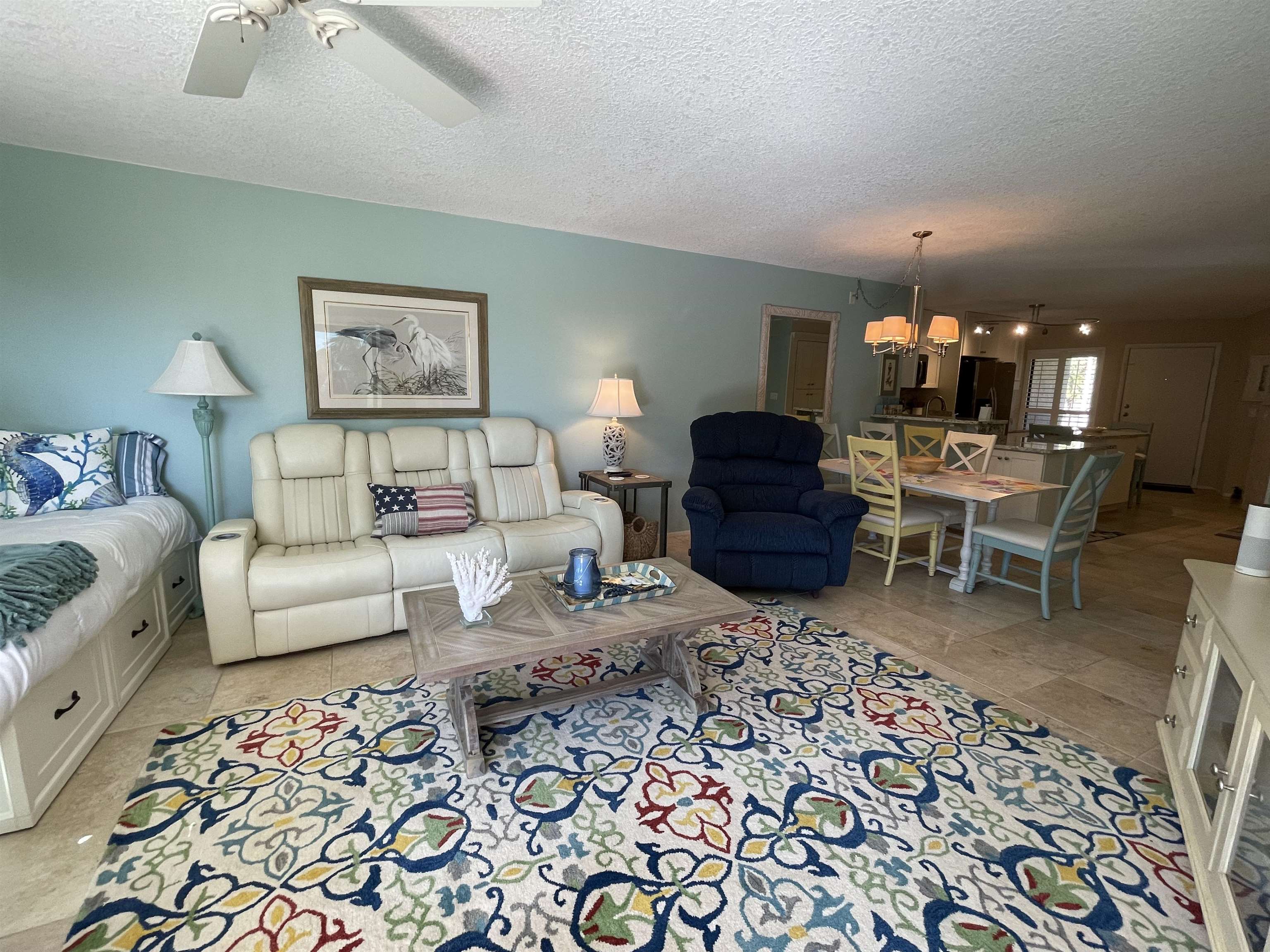 213 Pacifica Vista Way St. Augustine, FL 32080 - Photo 8 of 29 a living room with furniture and a flat screen tv